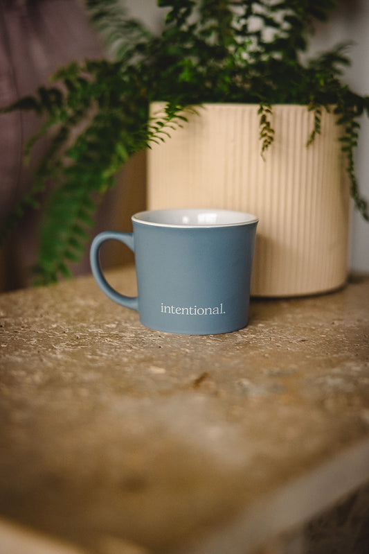 intentional. tea Mug